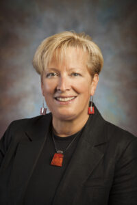 Portrait of the late Pam Brewer, former director of student leadership and involvement, and associate dean of students