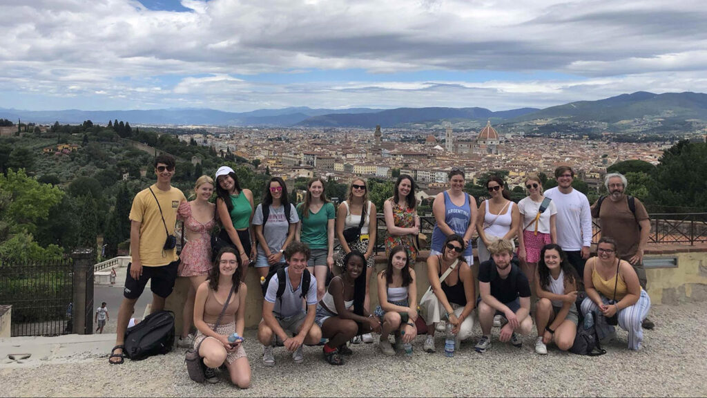 Prof. Ben Cohen and Tamara Carley's Summer 2022 Study Abroad students pose in a group photo in Italy
