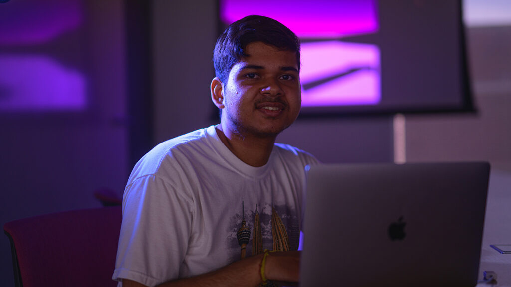 Padmanabh Kaushik ‘25 sits at a computer as he researches eye-gazing data for dyslexia detection