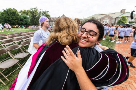 A student hugs President Nicole Farmer Hurd.