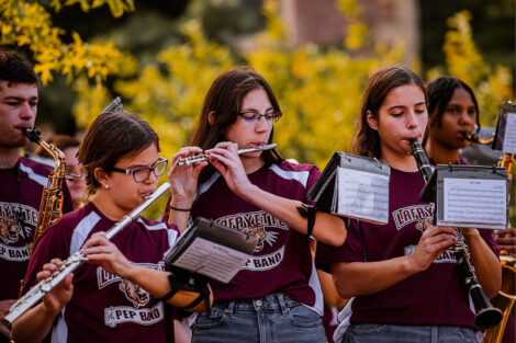 Students play in the band.