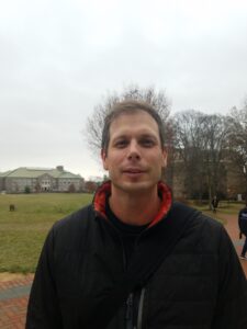 Prof. David Sunderlin poses outdoors on the Lafayette campus