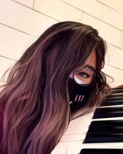 Maca in a mask with their face on a keyboard