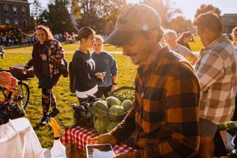 Students gathered around LaFarm produce stand on the Quad at Lafayette's Fall Fest 2022