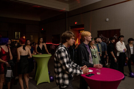 Students hang out during the LGBTQIA+ formal.