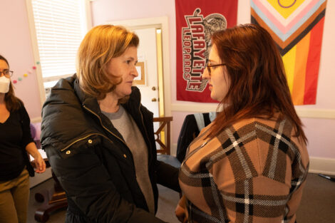 President Nicole Hurd speaks with a student.
