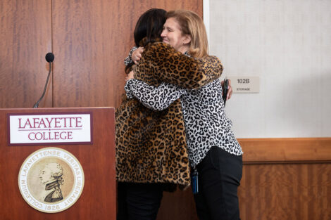 President Hurd and Sherryta Freeman embrace.