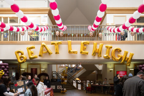 Balloons read Beat Lehigh, surrounded by maroon and white ballons