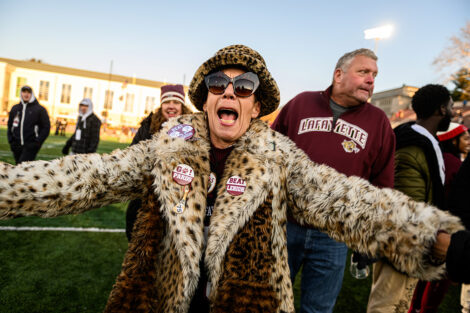 A fan decked out in Leopard celebrates.
