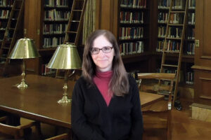 Prof. Silverstein smiles in Kirby Library.