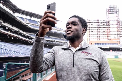 Lafayette student Jean Regnier taking photos in Citizens Bank Park during his externship with the Philadelphia Phillies