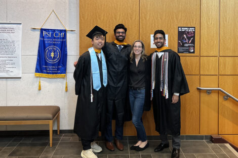 Harshil and fellow students smile with Prof. Lisa Gabel.
