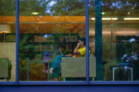 A student works in the library.