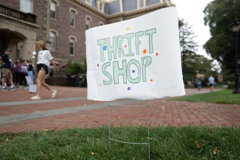 A sign reads Thrift Shop outside of Pardee Hall.