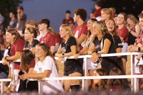Fans watch the mens soccer game in the new Gummeson Grounds stadium.