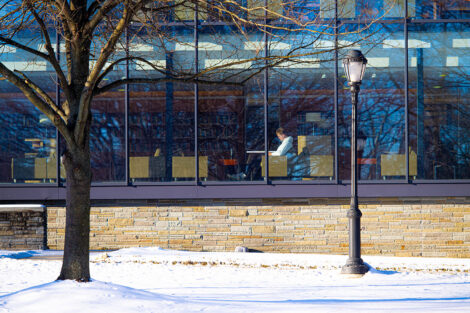 A student studies in Skillman Library.