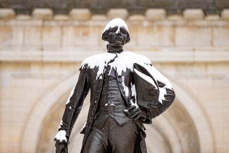 Marquis de Lafayette statue is featured with snow.