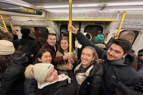 Students on a crowded Underground.