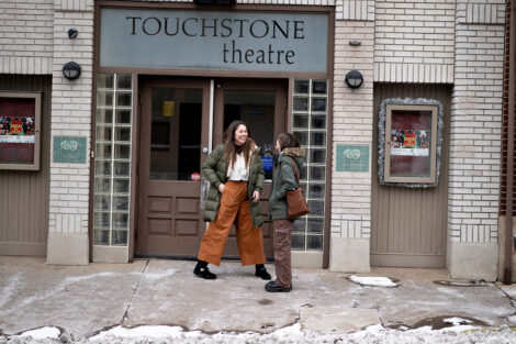McKenna Graf ’26 and Sam Beedle pose outside of Touchstone Theatre.