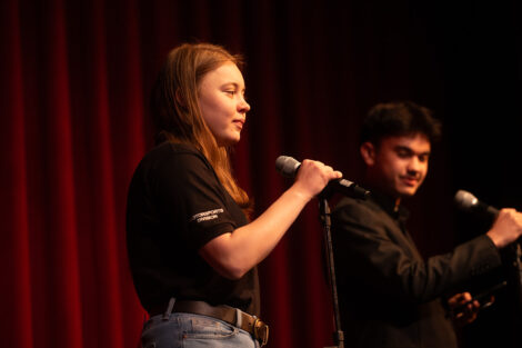 Students perform onstage at Grand Finale.
