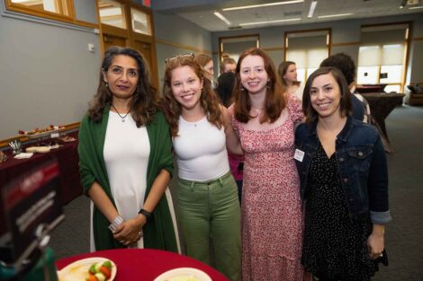 Nandini Sikand, two students, and Jodi Fowler stand together at the Landis Awards ceremony.