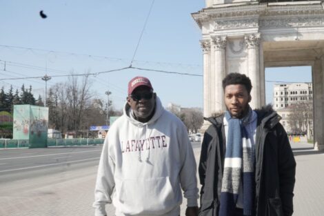 Prof. Gladstone “Fluney” Hutchinson (left) catches up with former Gladstone Whitman Fellow Jonathan Ford ’23, now in the Peace Corps working on a community building mission in Moldova