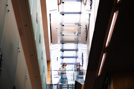 A student walks in the library