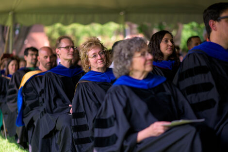 Faculty listen during convocation