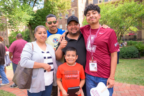 Families smile with their students