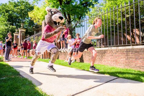 A student races the Leopard.