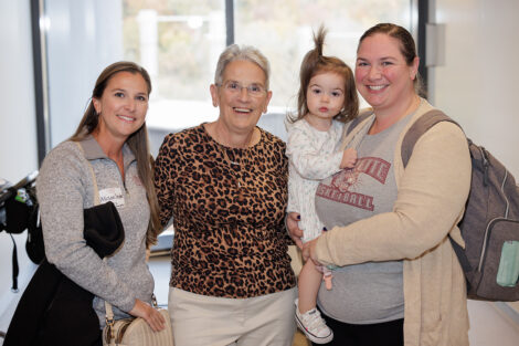 Rosie is with her two daughters and grandaughter.