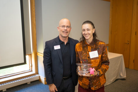 Mike Summers Associate Vice President, Gateway Career Center is standing with Danielle Bero '07. Danielle is holding a glass award.