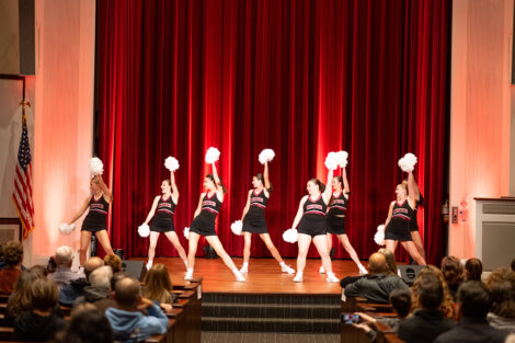 The cheer team performs at the Student Performance Showcase in Colton Chapel.