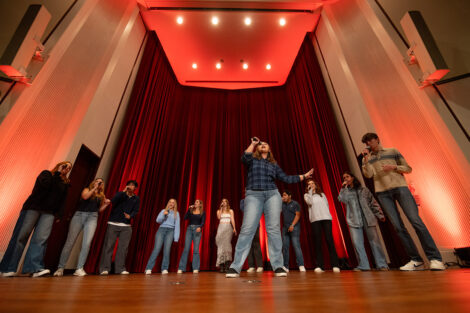 A group of students sing at the the student performance showcase.