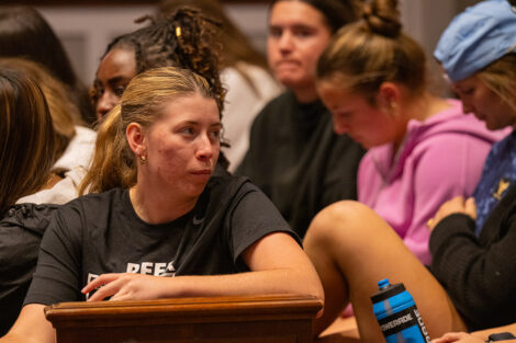 Students speak in the audience at Colton.