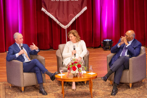 President Hurd, Harold Ford Jr., and Michael Steele sit on the stage of Colton Chapel.