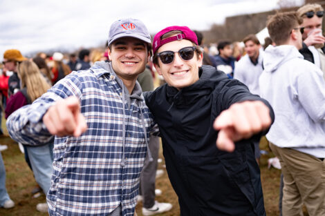 Students smile, wearing leopard, maroon, and white.