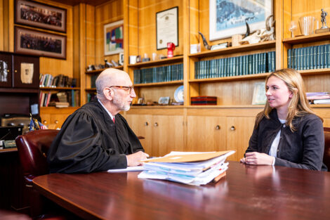 A student and Hon. Reichly in a courtroom