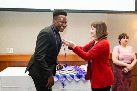 A person gets chords at Lavender Celebration.