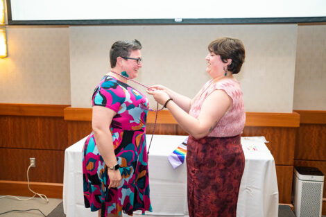 A person gets chords at Lavender Celebration.