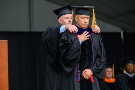 A person receives the honorary degree