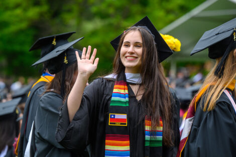 A graduate waves