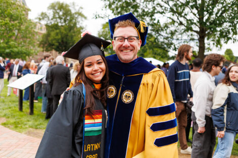 Graduates embrace their family and friends.