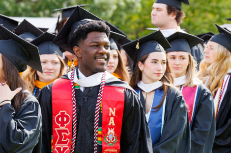 A graduate smiles