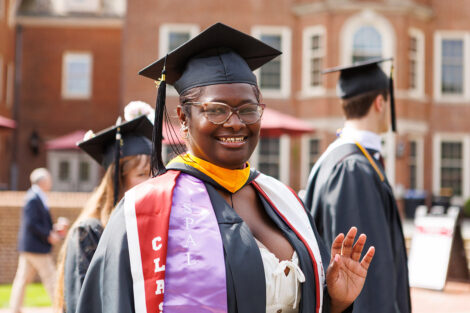 A graduate smiles