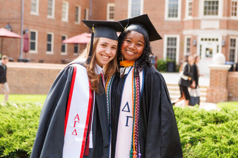 Graduates smile