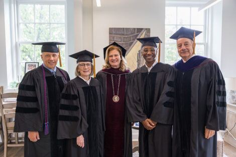 Left to right, honorary degree recipients Lt. Gen. (Retired) Stuart W. Risch ’84, Janice D. Komisor, President Nicole Hurd, Commencement speaker and honorary degree recipient MK Asante '04, and Chair of the Board of Trustees Bob Sell.