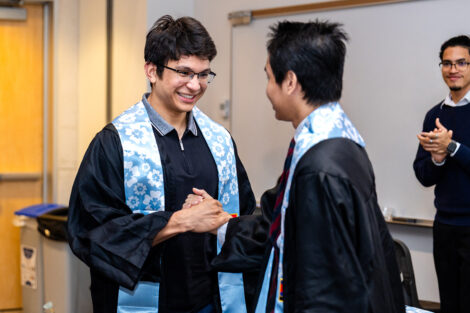 A student receives their stole at the APPI Celebration