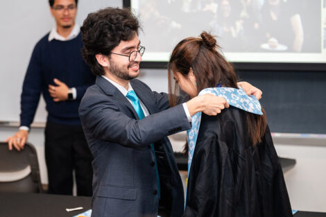 A student receives their stole at the APPI Celebration