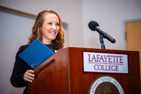 A student speaks at a podium